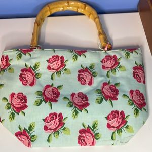 Teal and rose pattern handbag